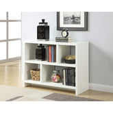A white bookcase displaying an assortment of books and decorative objects, creating a neat and inviting atmosphere.